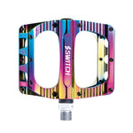 Pédales plateforme VTT Switch Freeride alu CNC 100 x 90 mm à picots (paire) – Oil slick