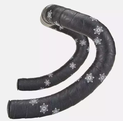 Ruban de cintre Supacaz - Super Sticky Kush Galaxy Tape WHT PRINT/ANO BLK PLUGS
